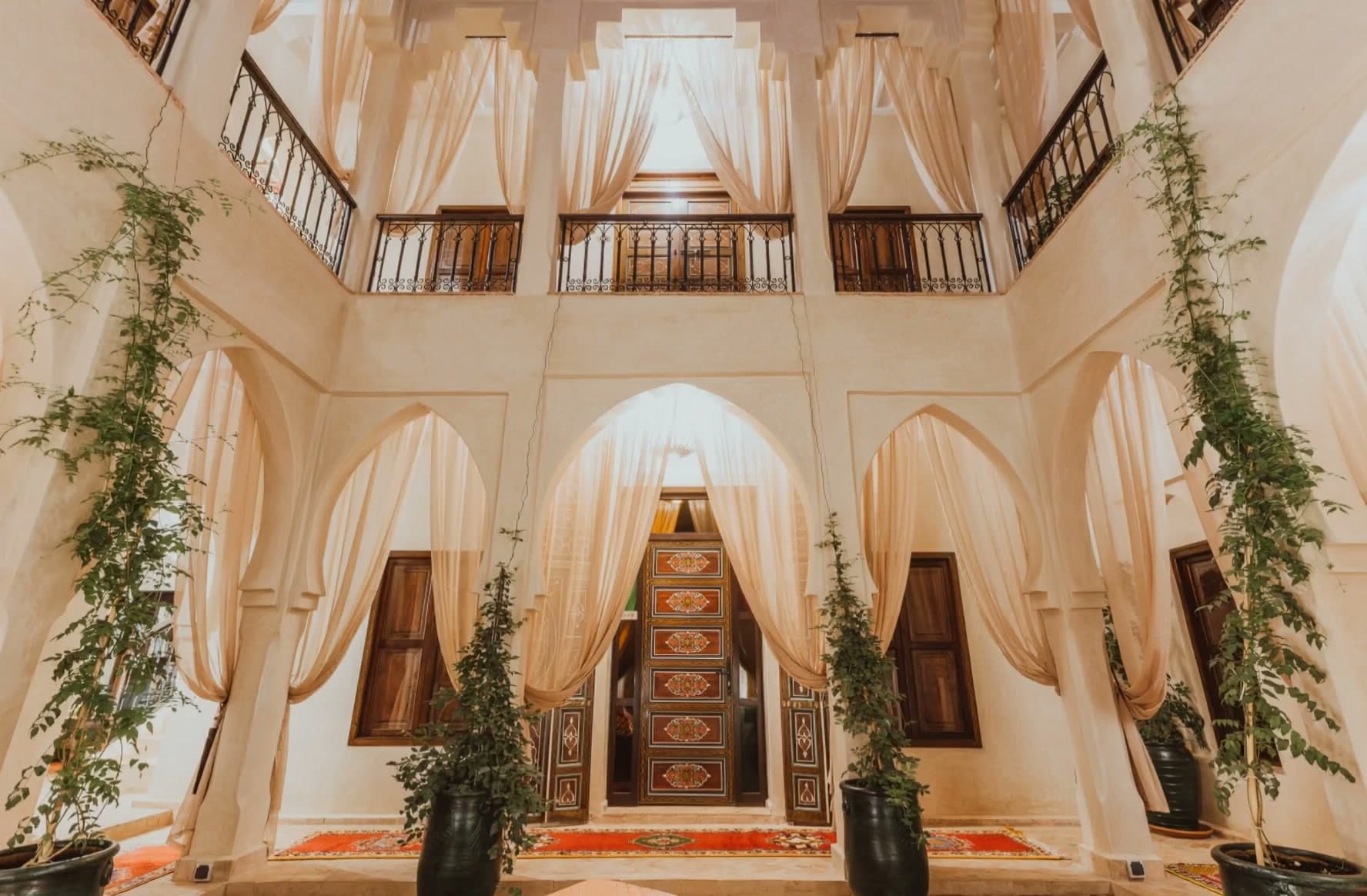 Riad courtyard at golden hour — Experience Hospitality Group